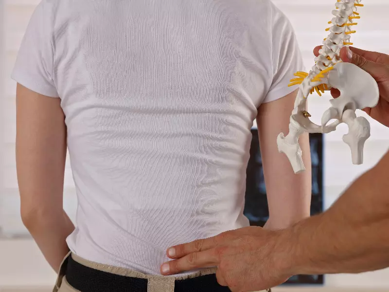 SI Joint Pain Treatment Near Me in Belmar, NJ. Chiropractic Exam For SI Joint Pain Relief.